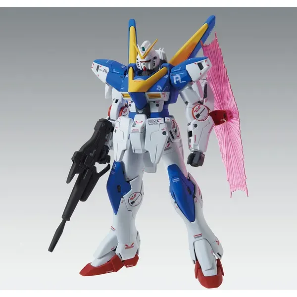 MG 1/100 V2ガンダム Ver.Kaの公式の商品写真。白・青・黄の機体がビーム・ライフルを持ち、背中から光の翼が出ている